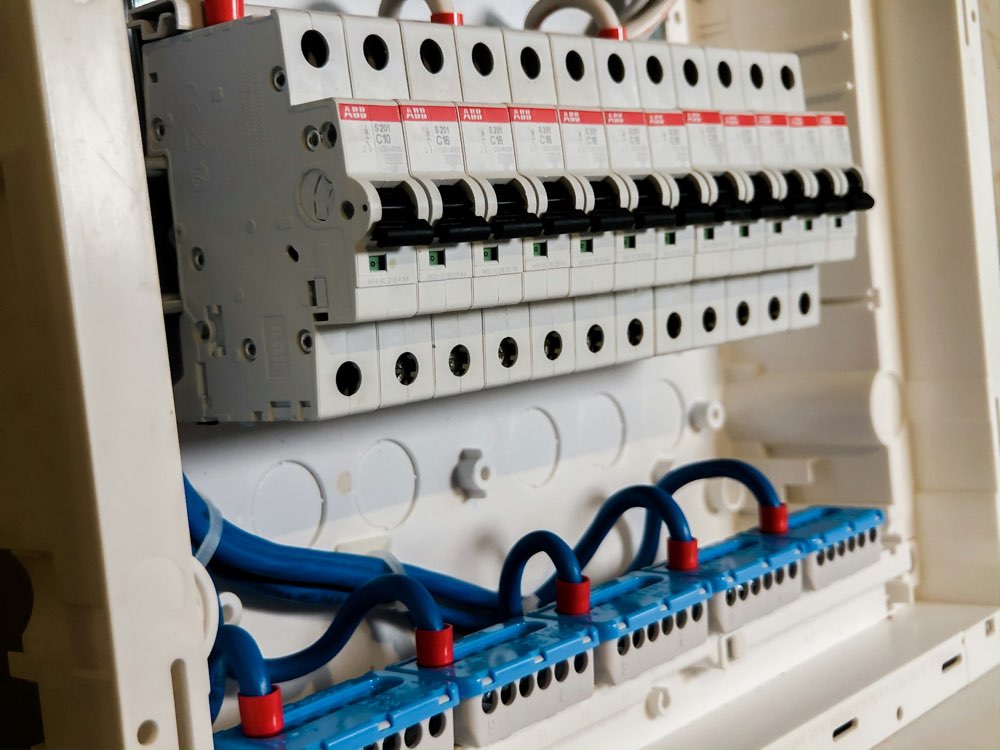 Electrical service panel with circuit breakers inspected for safety