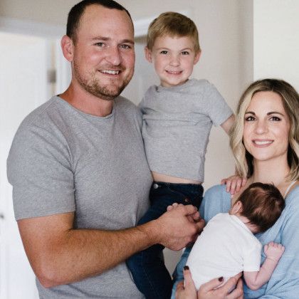 Tyler Sherman with his wife Sarah and their sons Brooks and Maverick