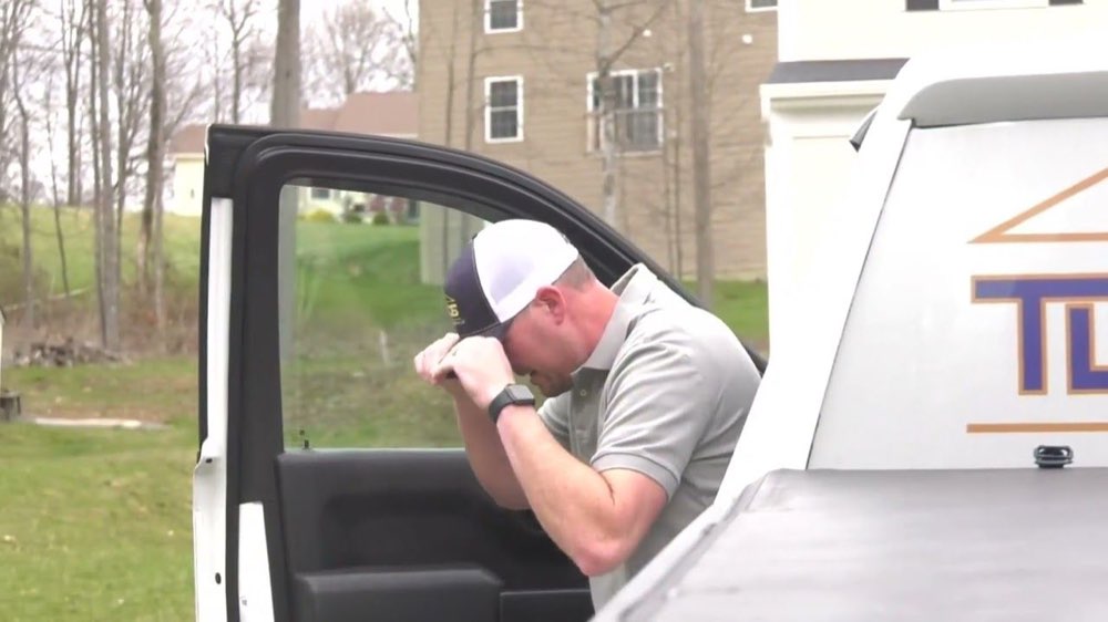 Tyler Sherman, owner of TDS Home Inspection, arriving at an inspection in his branded truck